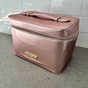 Lancôme limited-edition holiday beauty box train case in a metallic rose gold